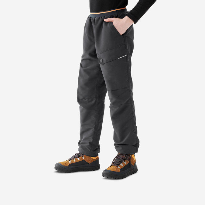 





CHILDREN'S WARM WATER-REPELLENT HIKING TROUSERS - SH100 - AGE 7-15, photo 1 of 9